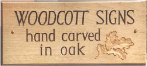 Wooden Signs and wooden fire surrounds by Woodcott of Bath.